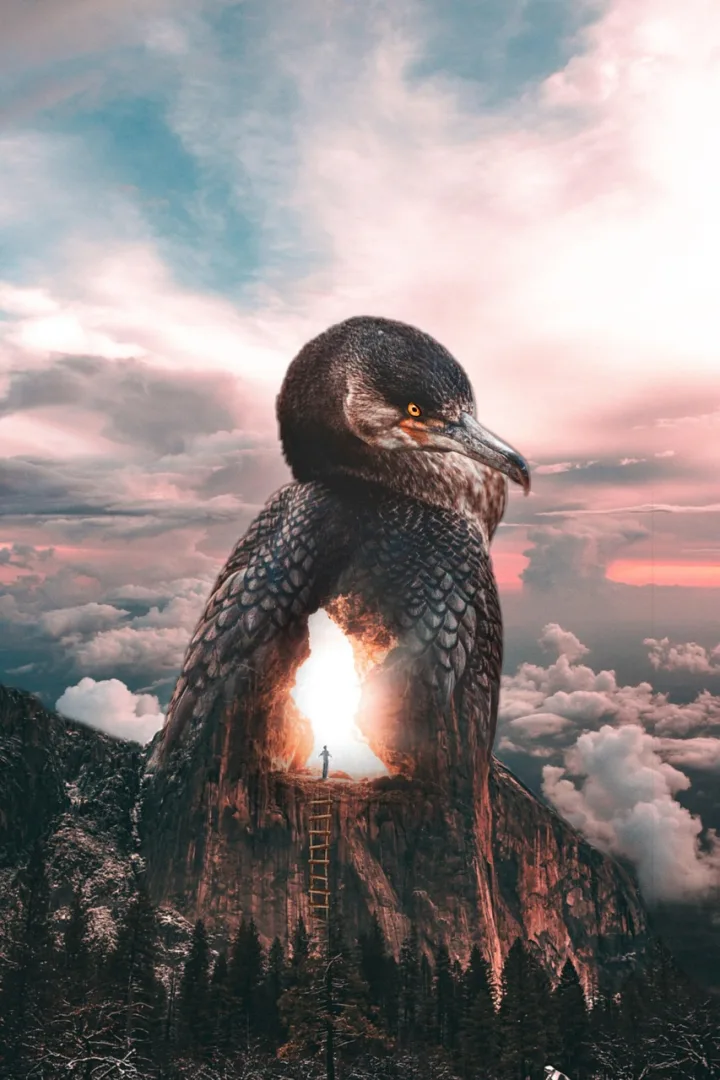 A surreal bird-shaped mountain opening onto a bright horizon